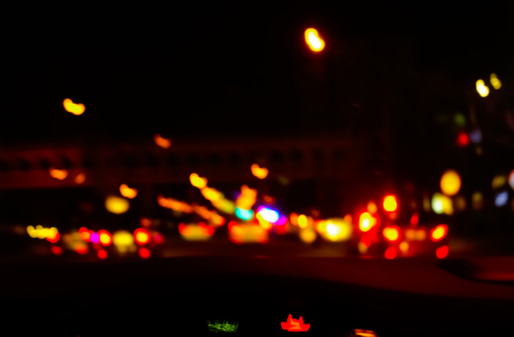 A point of view of how someone with astigmatism sees city night lights.