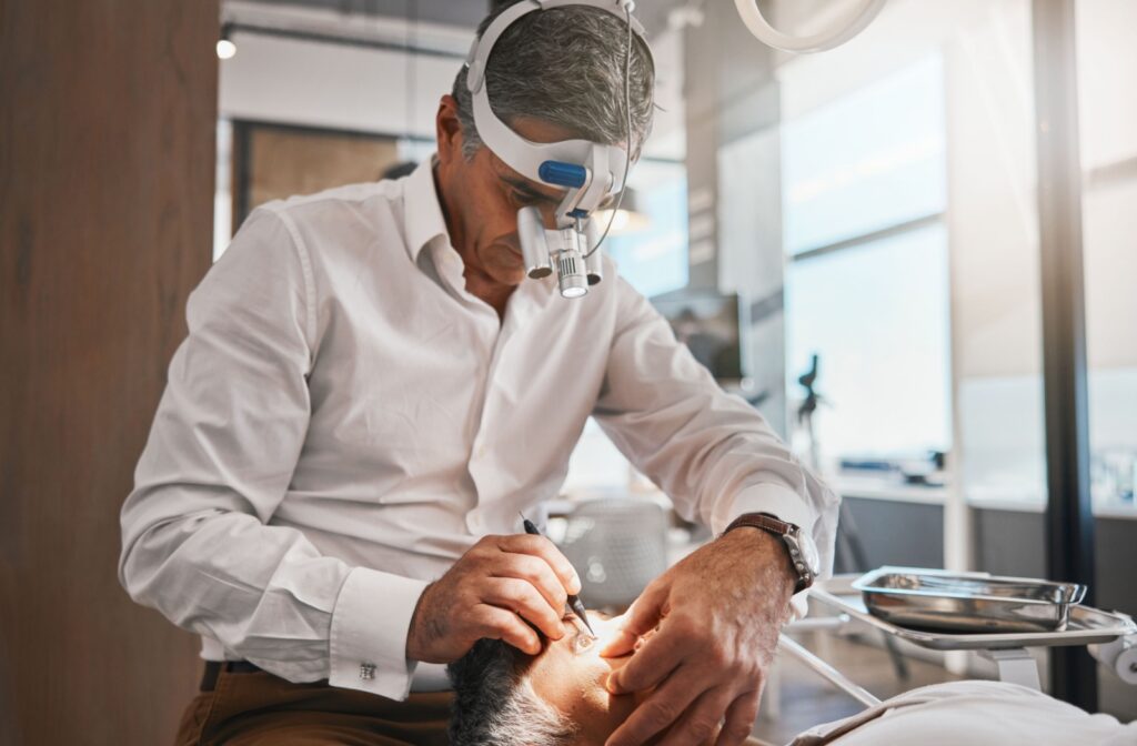An ophthalmologist performing cataract surgery on a patient.