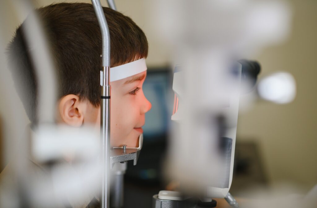 A young child having a myopia control consultation at their eye doctor.